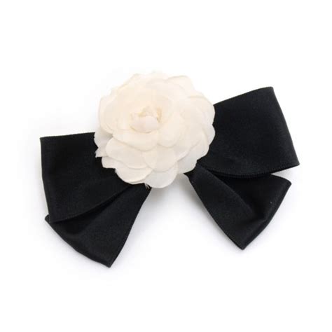 chanel white cameilla and black ribbon bow|Chanel Camellia Bow .